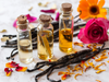 Set of three glass jars with vanilla pods and dried calendula and rose petals