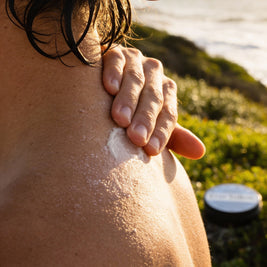 Ever Tallow's Beard balm blurred behind a surfer after a swim