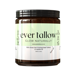 Jar of Ever Tallow, Beef tallow and jojoba oil with a green label on a white background