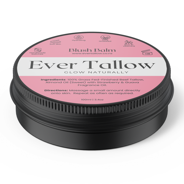 A round black jar of Blush Balm Ever Tallow fragrance oil with a pink and white label, shown on a clean white background.