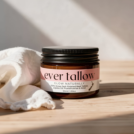 Jar of 'ever tallow' on a wooden surface with a white cloth