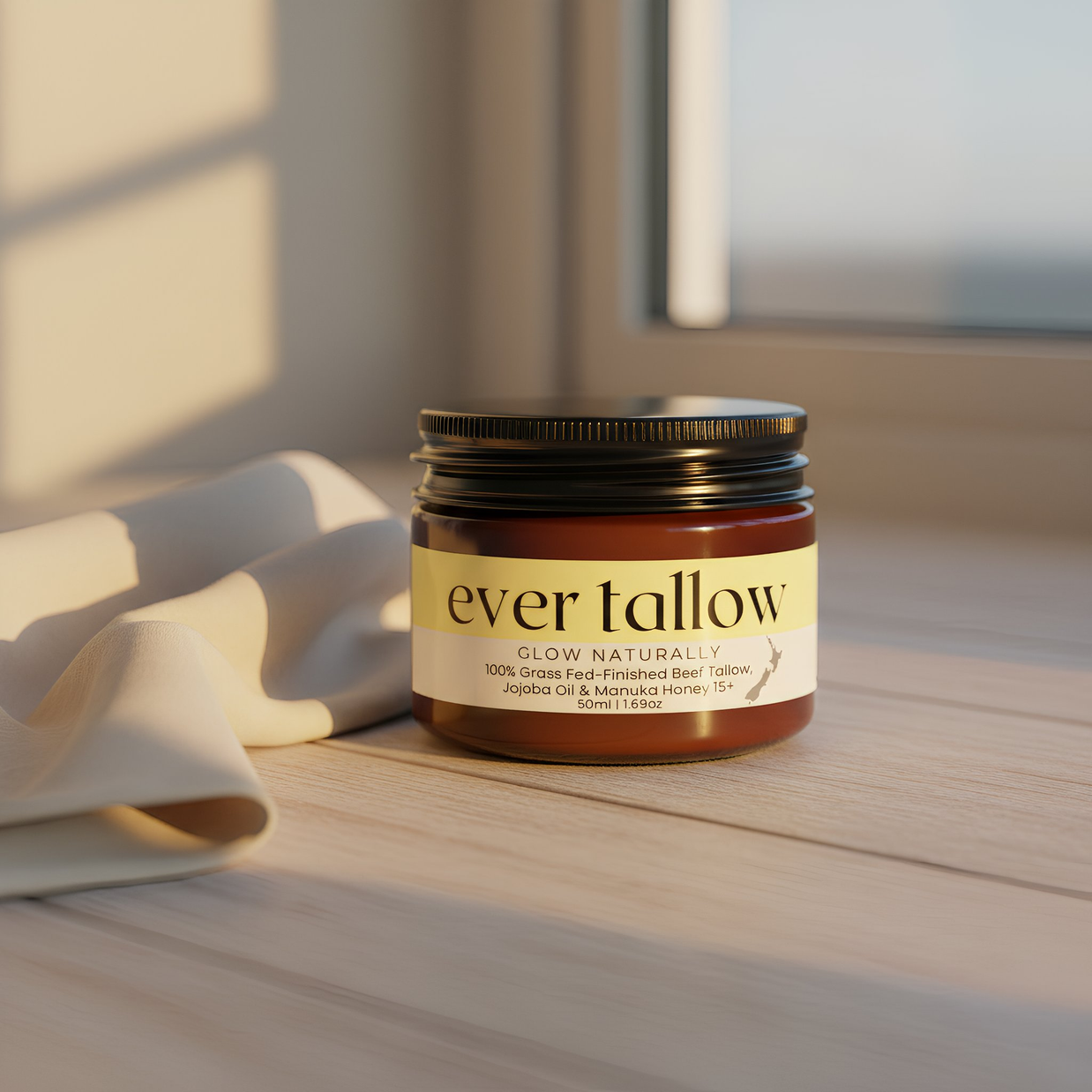 Jar of 'ever tallow' product on a wooden surface with soft lighting