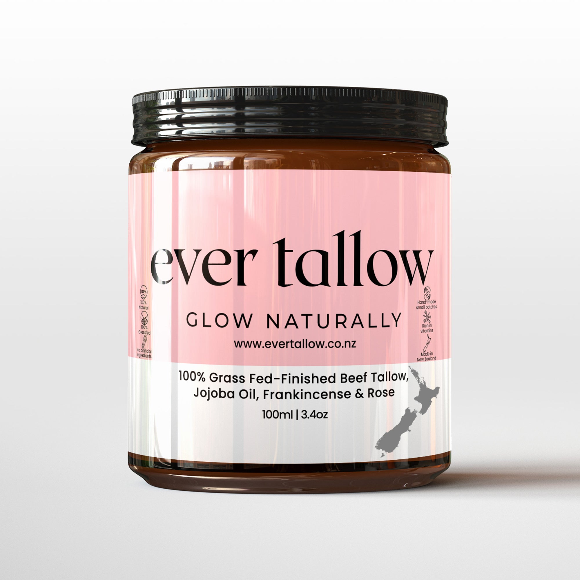 A jar of Ever Tallow Beef Tallow with Jojoba Oil, Frankincense, and Rose, with the label displaying the brand name and product description.