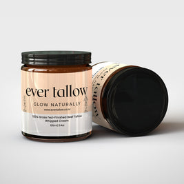 Two jars of Bar Tallow.  One jar is on its side
