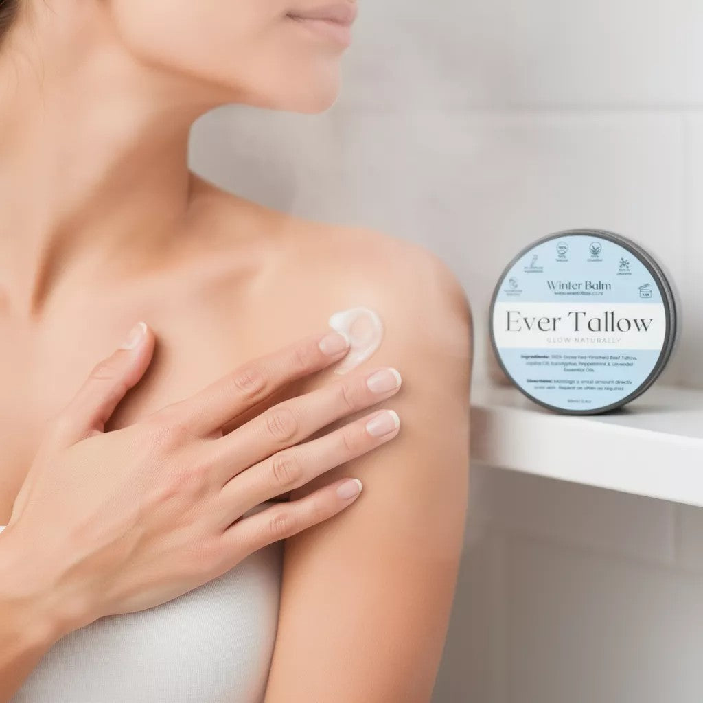 Person applying cream to shoulder with Ever Tallow balm container in the background